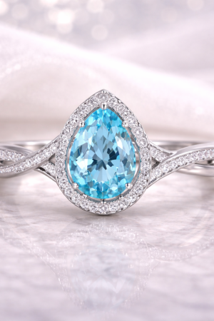 Gleaming Blue Topaz and Diamond Ring